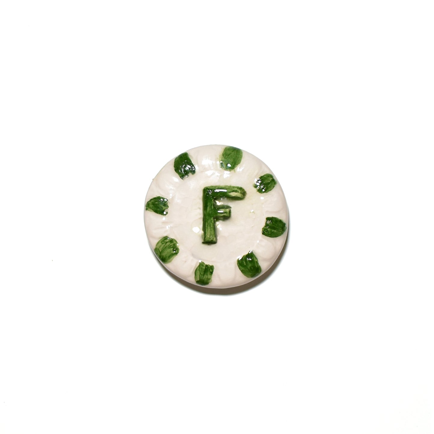 "CLA 3 Cristallina Trasparente Lucida Apiombica prodotto ceramico di alta qualità, perfetto per artisti e professionisti, mostra un disco bianco con decorazioni verdi e la lettera 'F' al centro, Smalti, Colori e Cristalline, Cristalline Lucide AP VLA, Colori Apiombici, Cristallina Neutra, AVADA - Best Sellers, Collezione Ditta Fauci, AVADA Email Marketing - Best Sellers, AVADA Email Marketing - Newest Products"